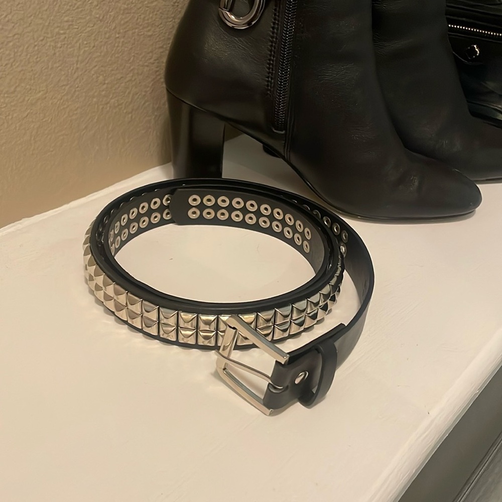 Black studded faux leather belt.